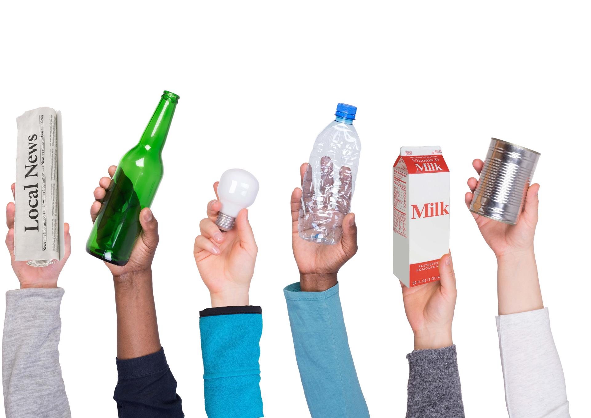 Hands holding various recyclable items