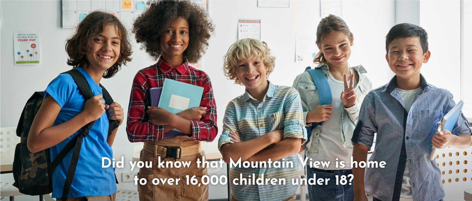 smiling school children with statement of over 16000 children under 18 in mountain view